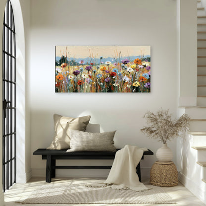 Colorful wildflower meadow painting canvas wall art in an entryway above a bench