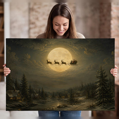 Santa sleigh full moon painting canvas wall art held in hands