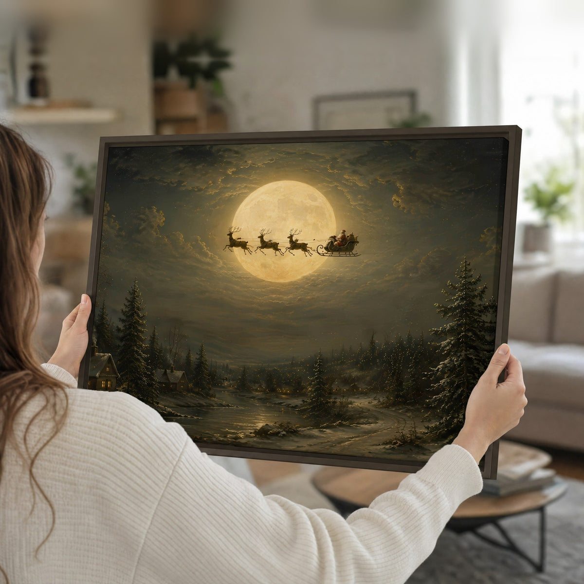 Santa sleigh full moon painting framed canvas held in hands