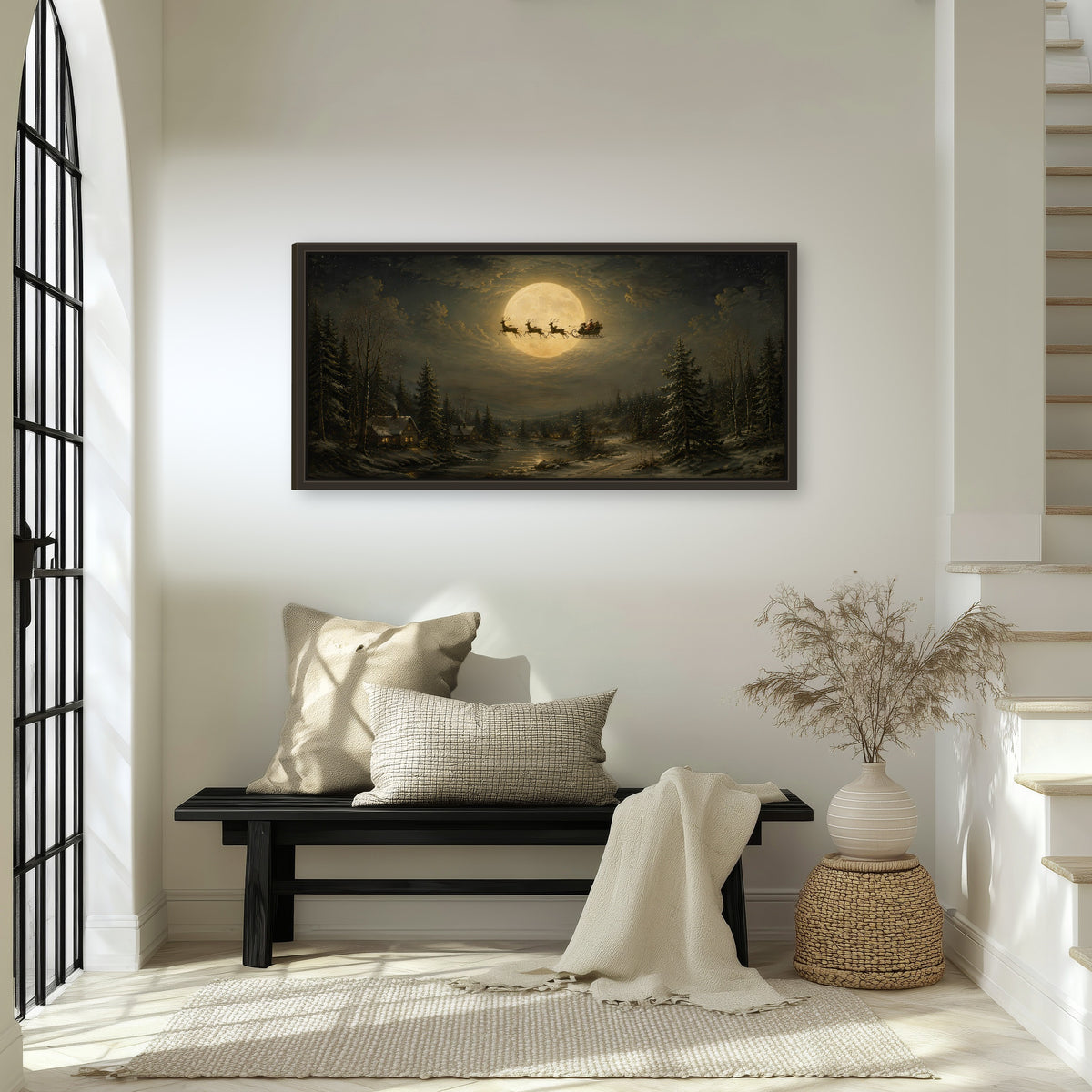 Santa sleigh full moon painting framed canvas wall art in an entryway above a bench