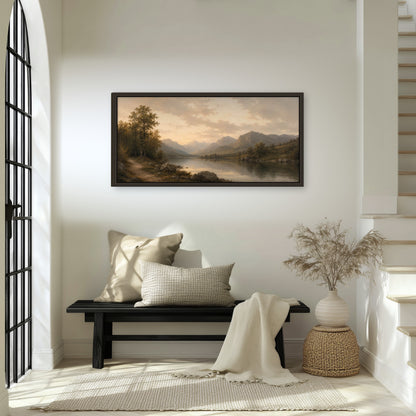 Golden mountain lake painting framed canvas wall art in an entryway above a bench