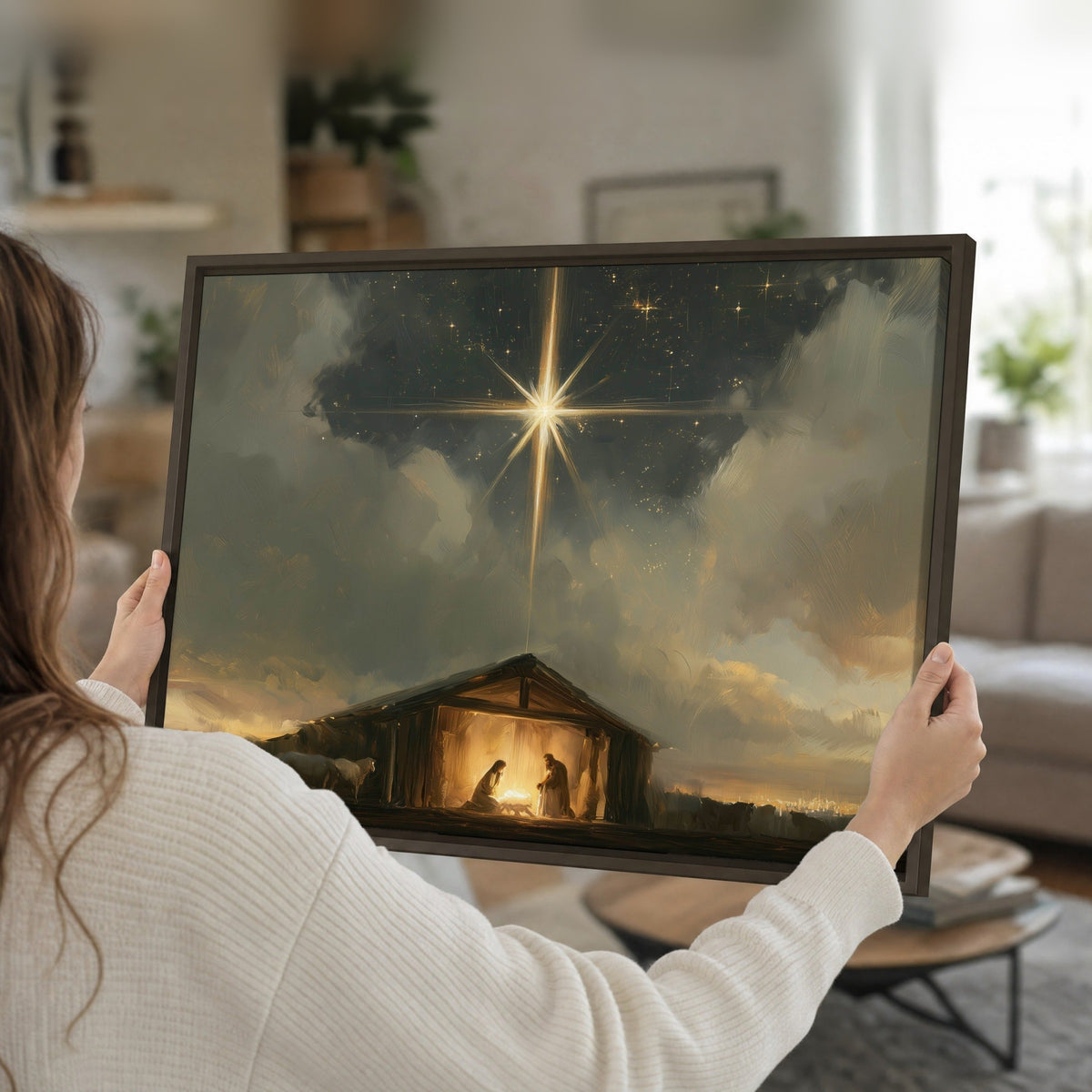 Nativity star of Bethlehem painting framed canvas held in hands