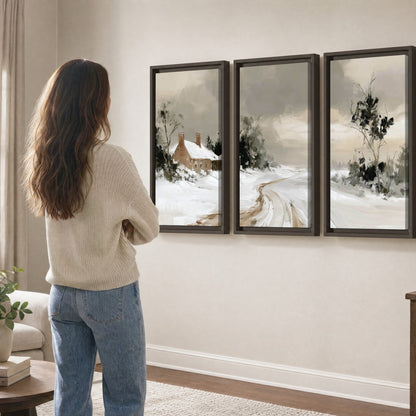 Neutral winter cottage painting 3 piece framed canvas in a living room