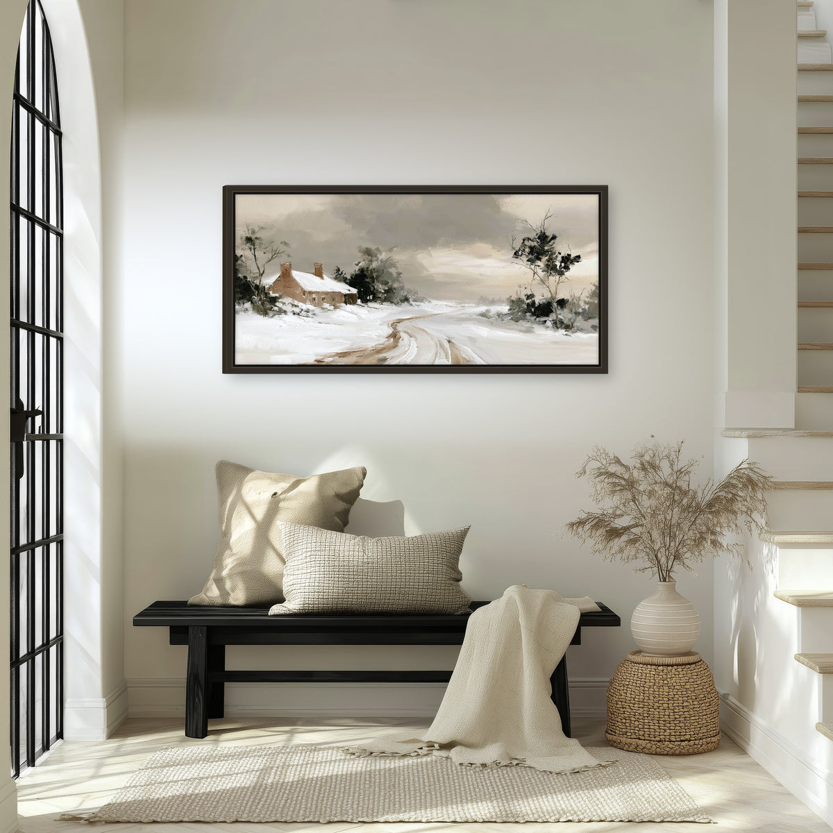 Neutral winter cottage painting framed canvas wall art in an entryway above a bench