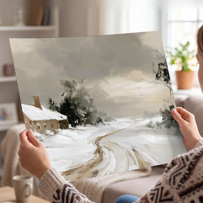 Neutral winter cottage painting poster print held in hands