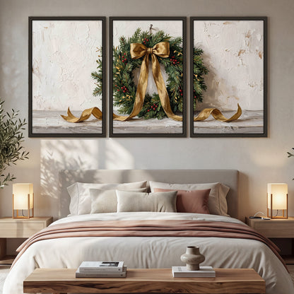 Christmas wreath gold ribbon painting 3 piece framed canvas in a bedroom above the bed