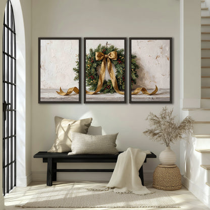 Christmas wreath gold ribbon painting 3 piece framed canvas in an entryway above a bench