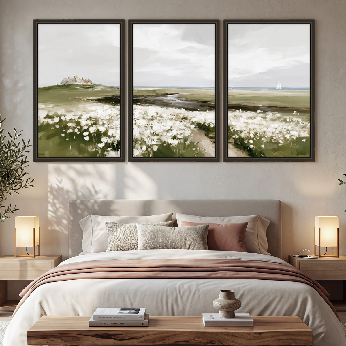Coastal wildflower meadow painting 3 piece framed canvas in a bedroom above the bed