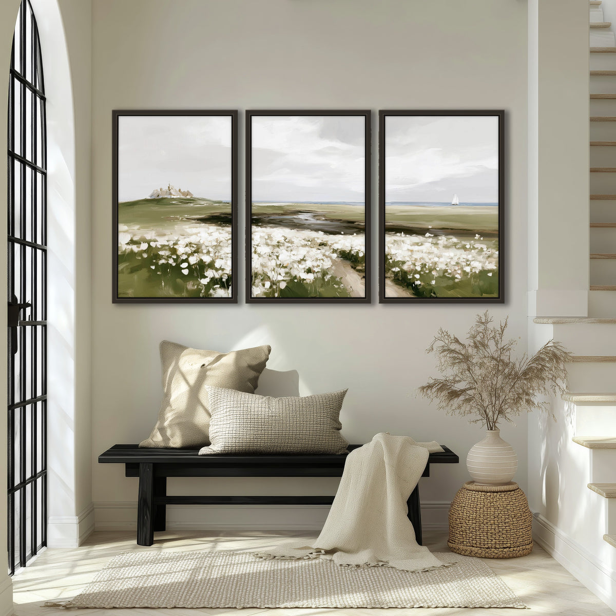 Coastal wildflower meadow painting 3 piece framed canvas in an entryway above a bench