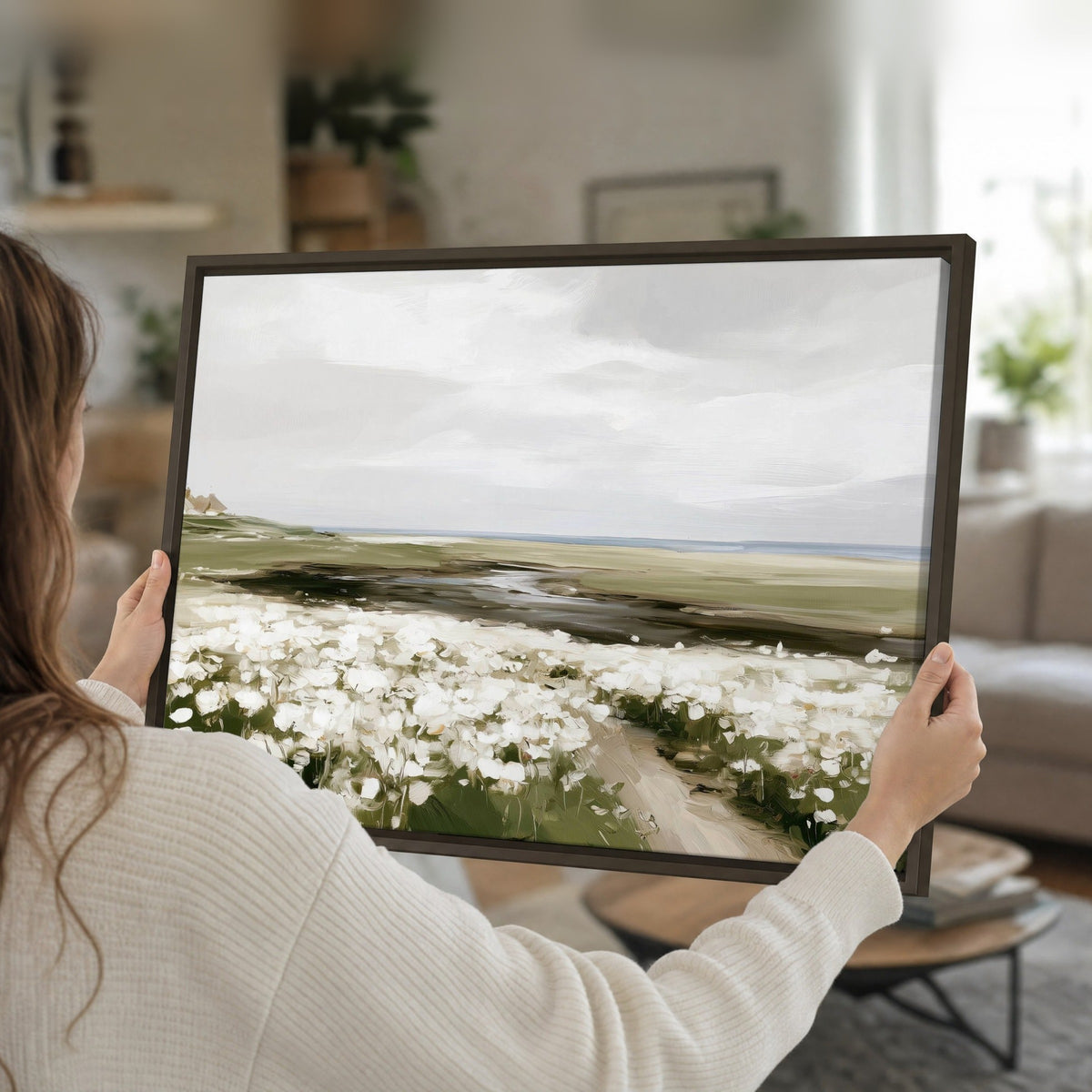 Coastal wildflower meadow painting framed canvas held in hands