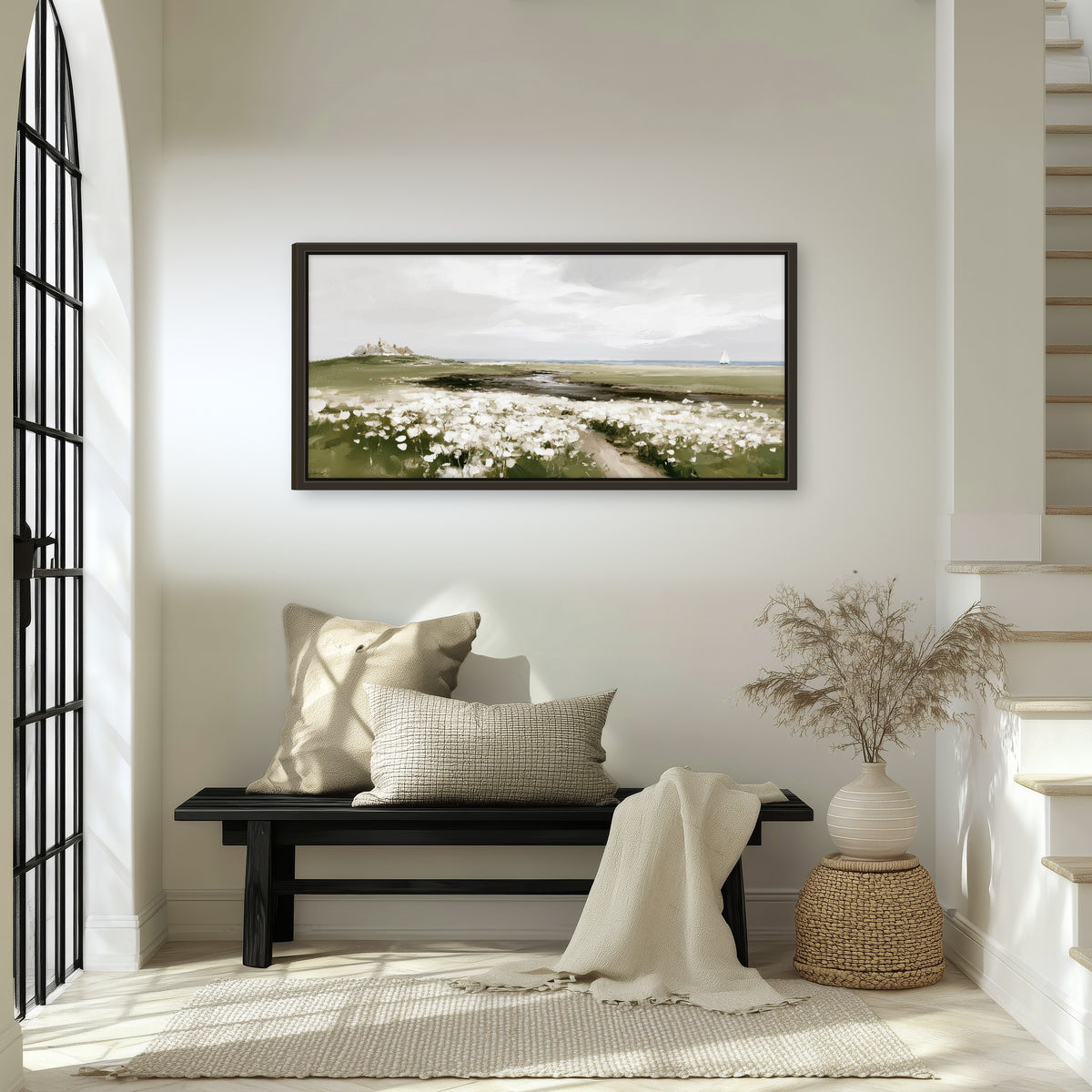 Coastal wildflower meadow painting framed canvas wall art in an entryway above a bench
