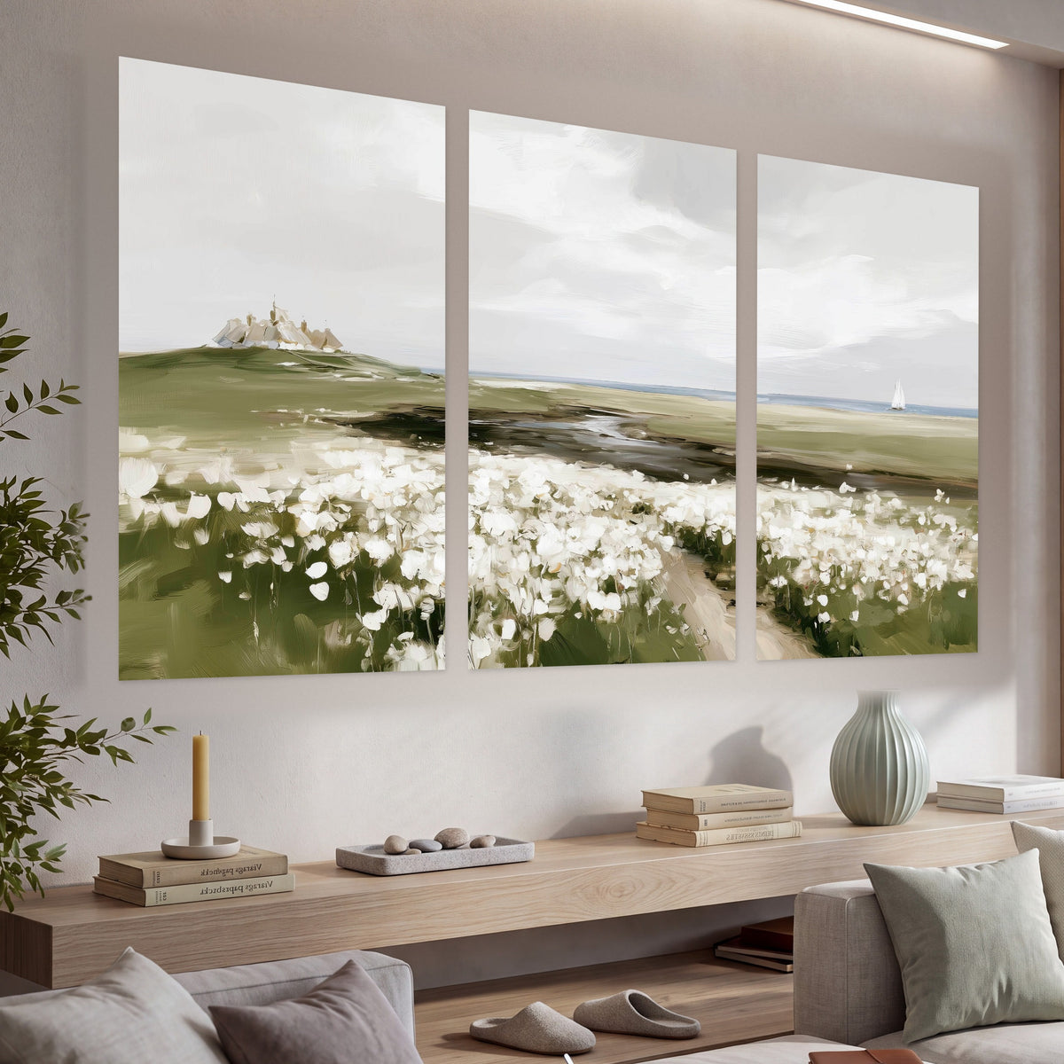 Coastal wildflower meadow painting set of 3 poster prints in a living room above a console