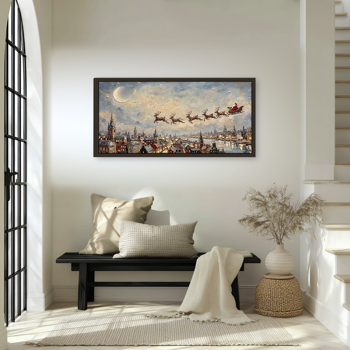 Santa sleigh over city painting framed canvas wall art in an entryway above a bench