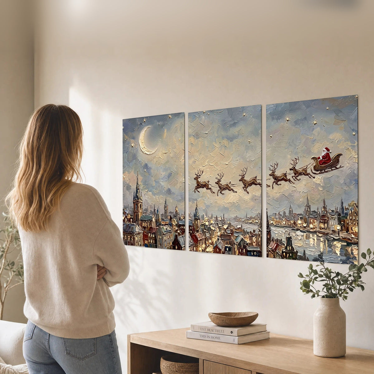 Santa sleigh over city painting set of 3 poster prints in a living room