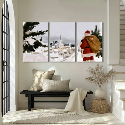Santa Claus snowy village painting 3 piece canvas wall art in an entryway above a bench