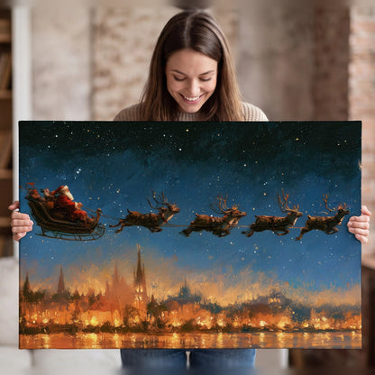 Santa sleigh starry night painting canvas wall art held in hands