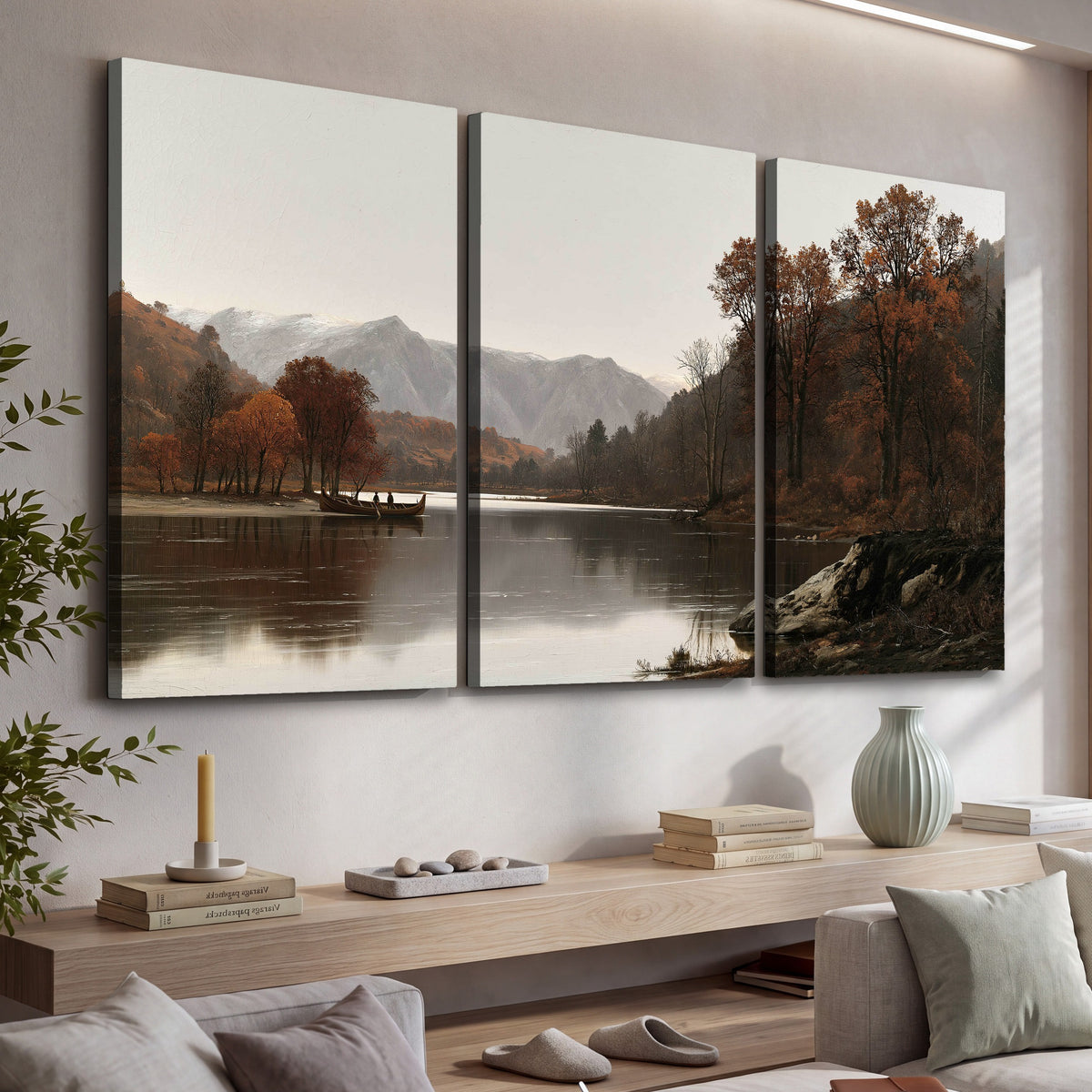 Autumn mountain lake rowboat painting 3 piece canvas wall art in a living room above a console