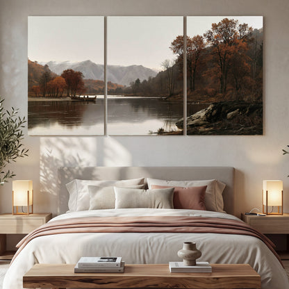 Autumn mountain lake rowboat painting 3 piece canvas wall art in a bedroom above the bed