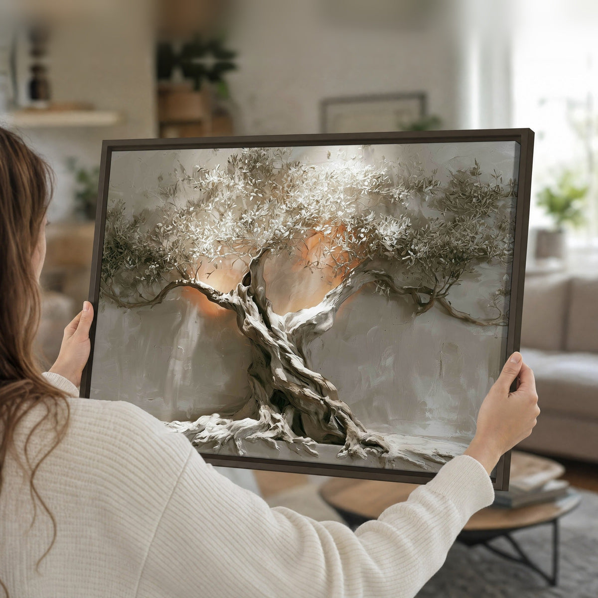 Glowing olive tree painting framed canvas held in hands