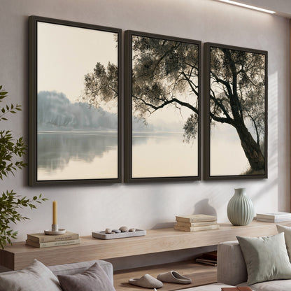 Tree silhouette misty lake painting 3 piece framed canvas in a living room above a console