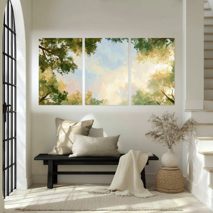 Tree canopy sky painting set of 3 poster prints in an entryway above a bench