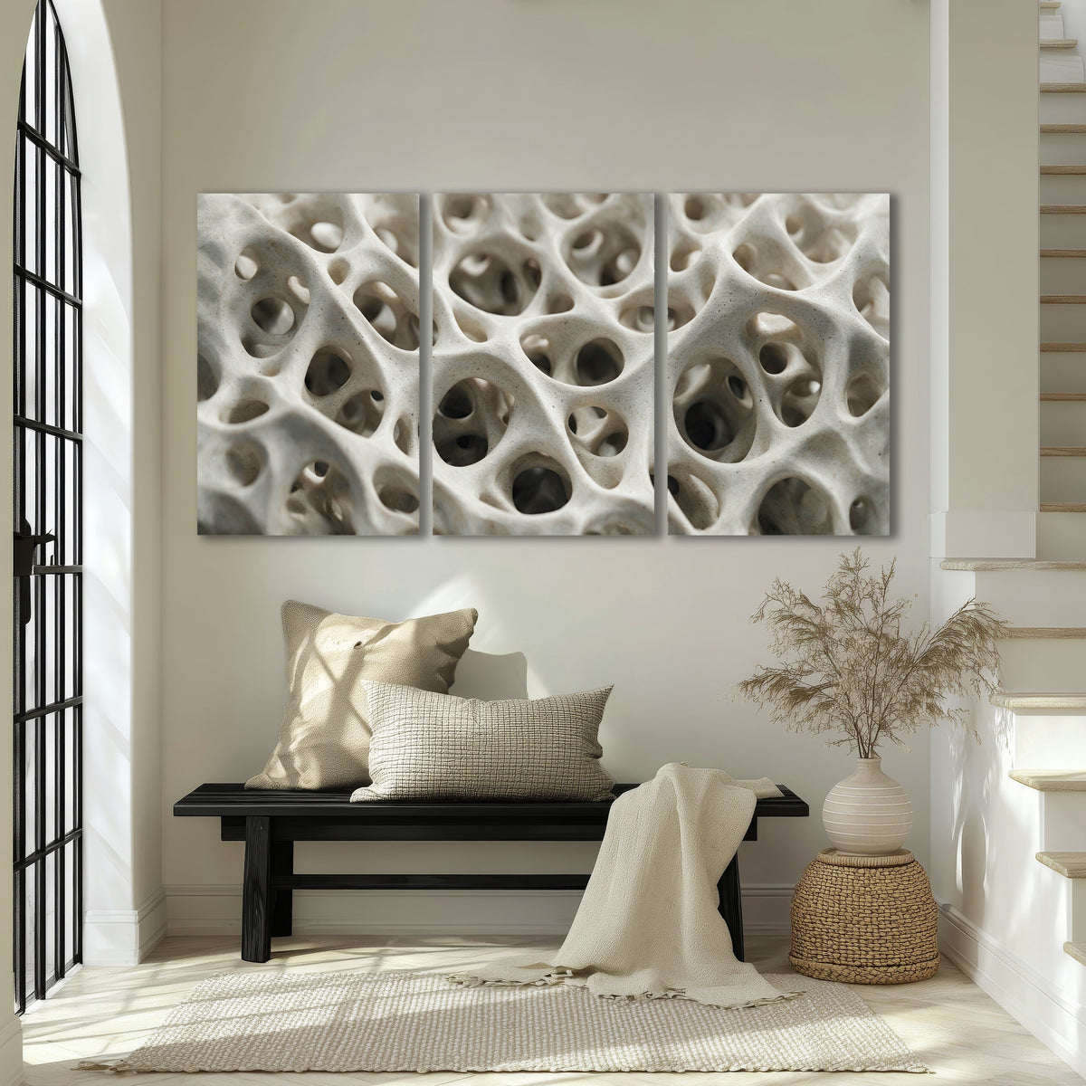 White organic texture abstract 3 piece canvas wall art in an entryway above a bench