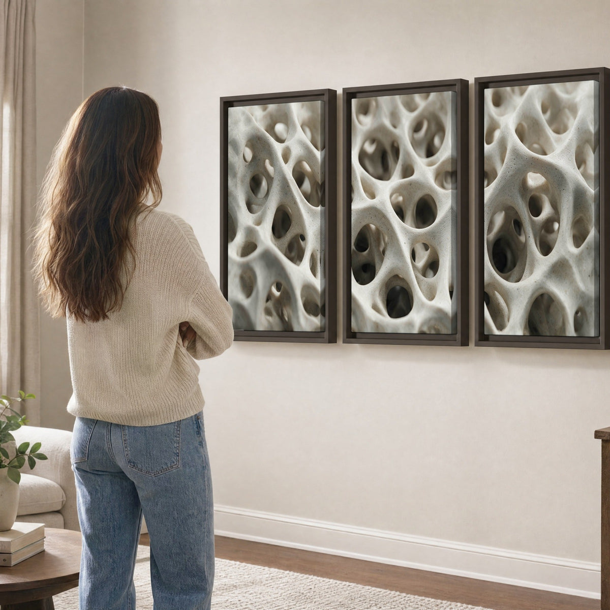 White organic texture abstract 3 piece framed canvas in a living room