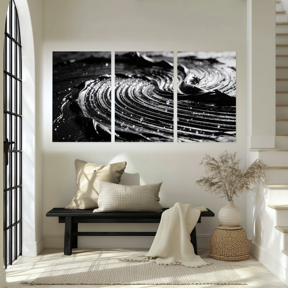Black and silver swirl abstract painting set of 3 poster prints in an entryway above a bench