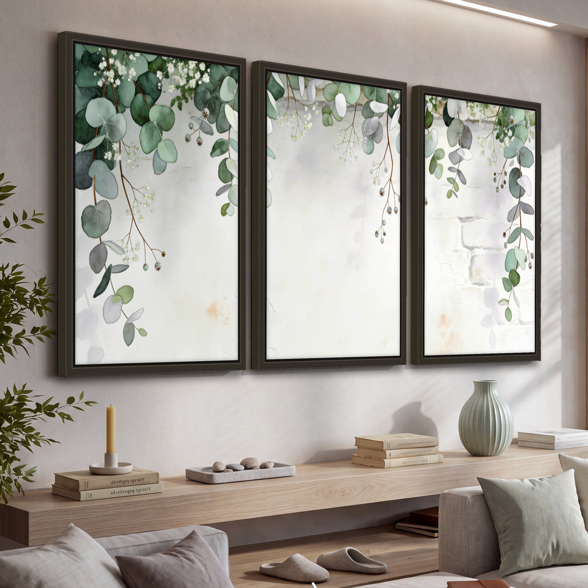 Watercolor eucalyptus greenery painting 3 piece framed canvas in a living room above a console
