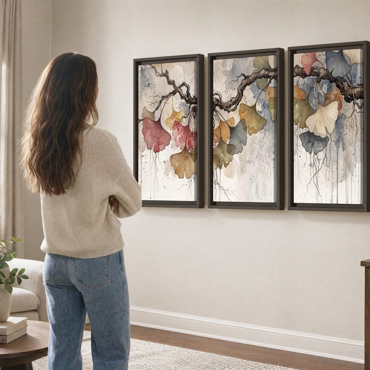 Ginkgo leaves watercolor painting 3 piece framed canvas in a living room