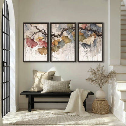 Ginkgo leaves watercolor painting 3 piece framed canvas in an entryway above a bench