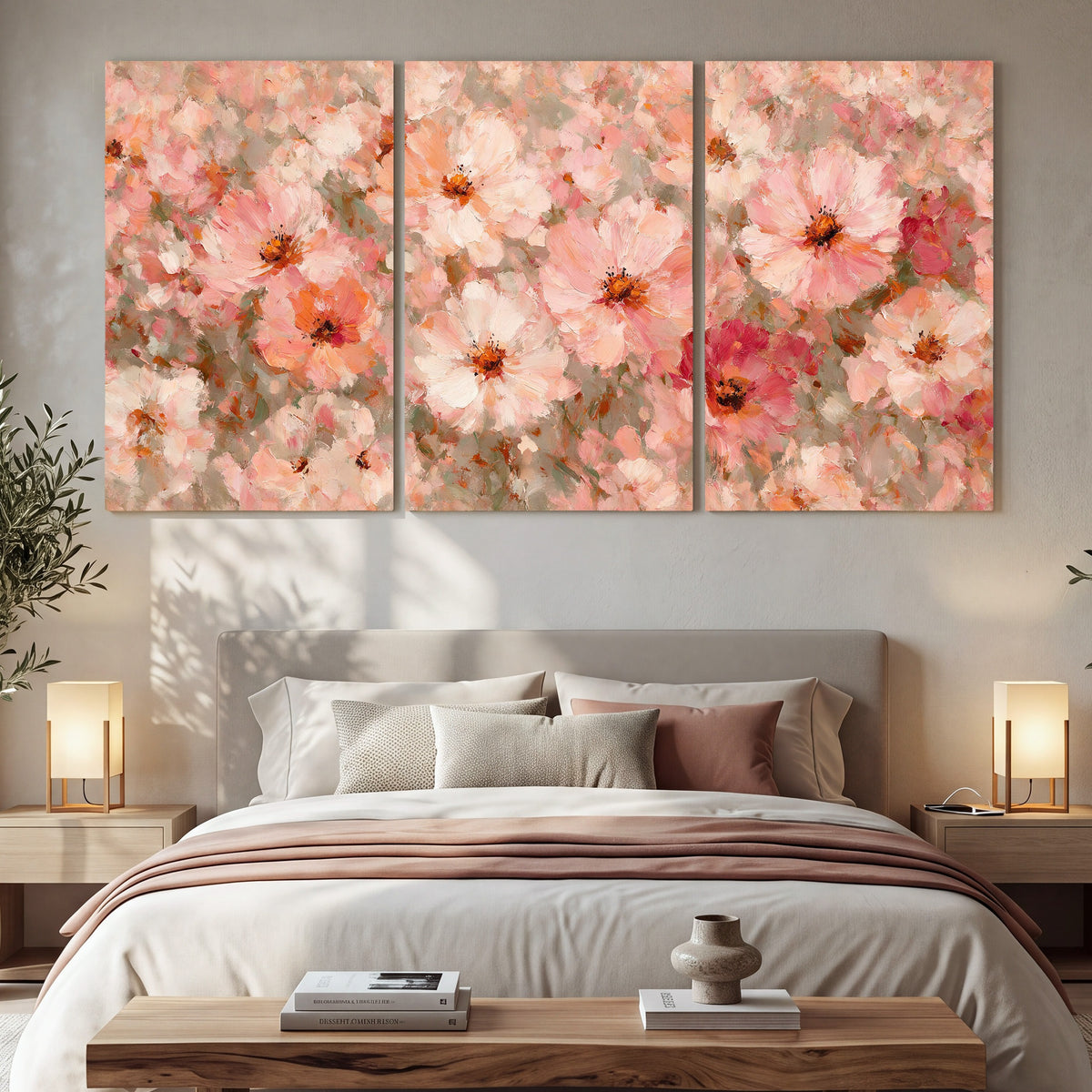 Blush pink flowers painting 3 piece canvas wall art in a bedroom above the bed