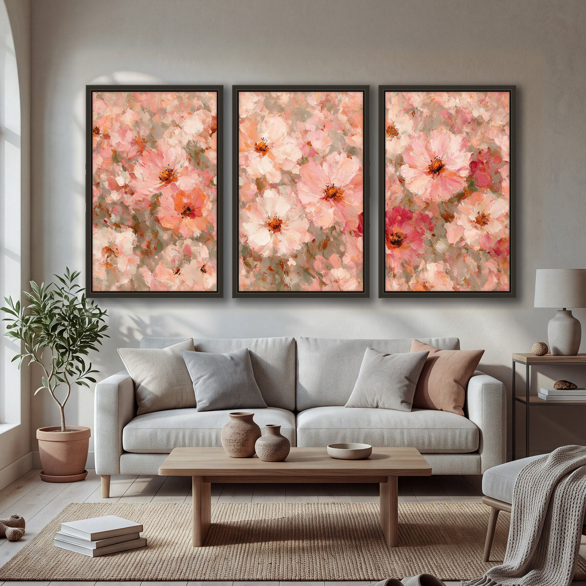 Blush pink flowers painting 3 piece framed canvas in a bright living room
