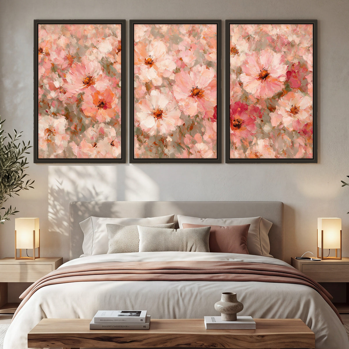 Blush pink flowers painting 3 piece framed canvas in a bedroom above the bed