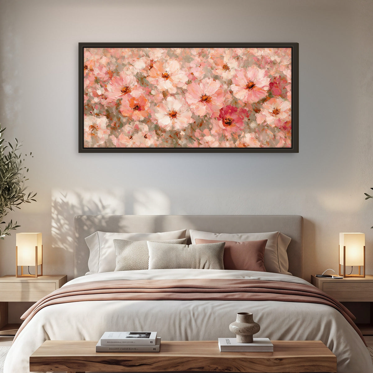 Blush pink flowers painting framed canvas wall art in a bedroom above the bed