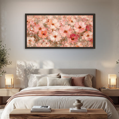 Blush pink flowers painting framed canvas wall art in a bedroom above the bed