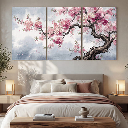 Cherry blossom tree painting 3 piece canvas wall art in a bedroom above the bed