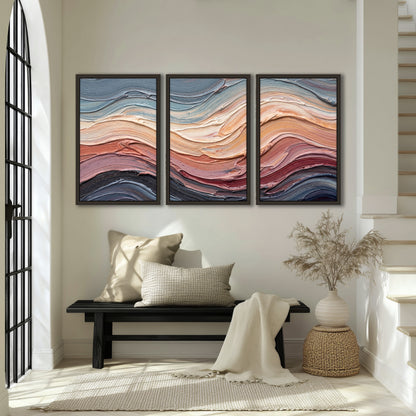 Pastel waves textured abstract painting 3 piece framed canvas in an entryway above a bench