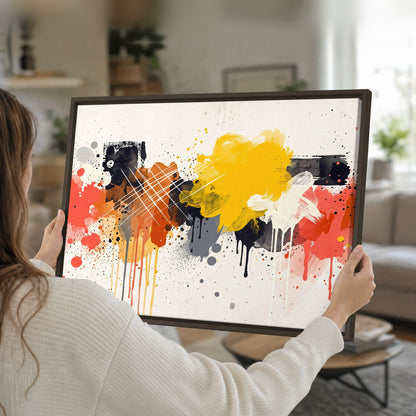 Paint splash abstract painting framed canvas held in hands