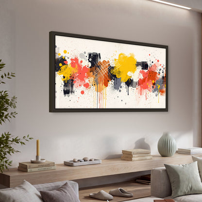 Paint splash abstract painting framed canvas wall art in a living room above a console