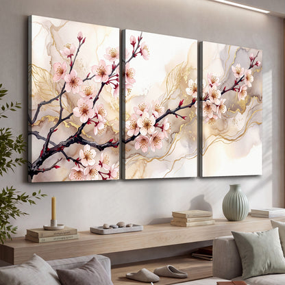 Cherry blossom branch with gold painting 3 piece canvas wall art in a living room above a console
