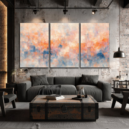 Peach and blue abstract painting 3 piece canvas wall art in an industrial loft