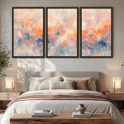 Peach and blue abstract painting 3 piece framed canvas in a bedroom above the bed