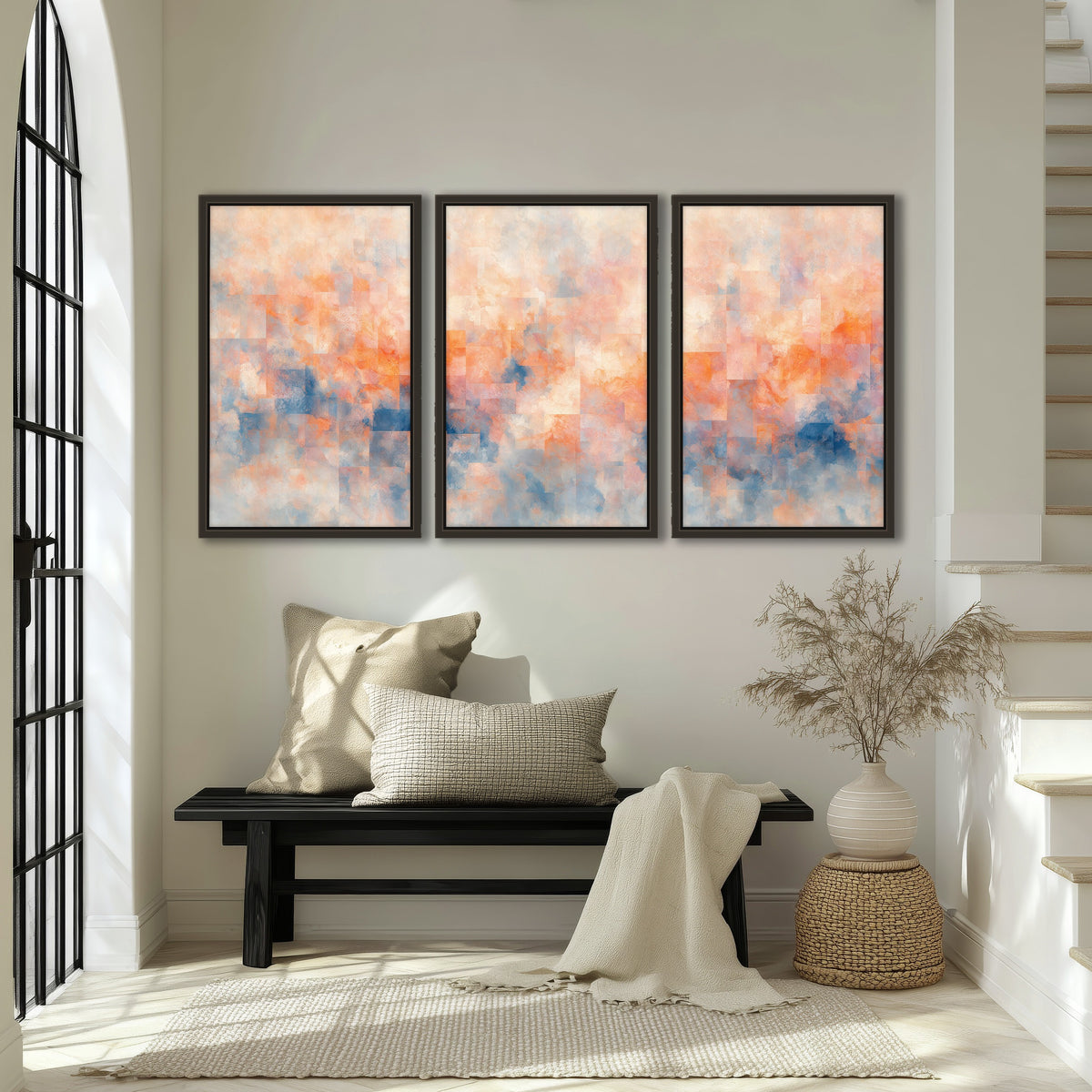 Peach and blue abstract painting 3 piece framed canvas in an entryway above a bench