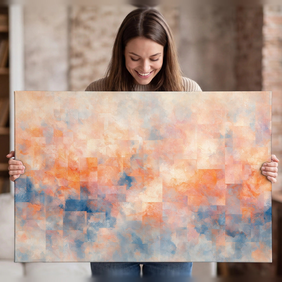 Peach and blue abstract painting canvas wall art held in hands