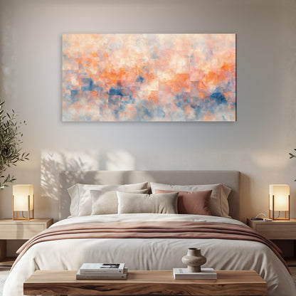 Peach and blue abstract painting canvas wall art in a bedroom above the bed