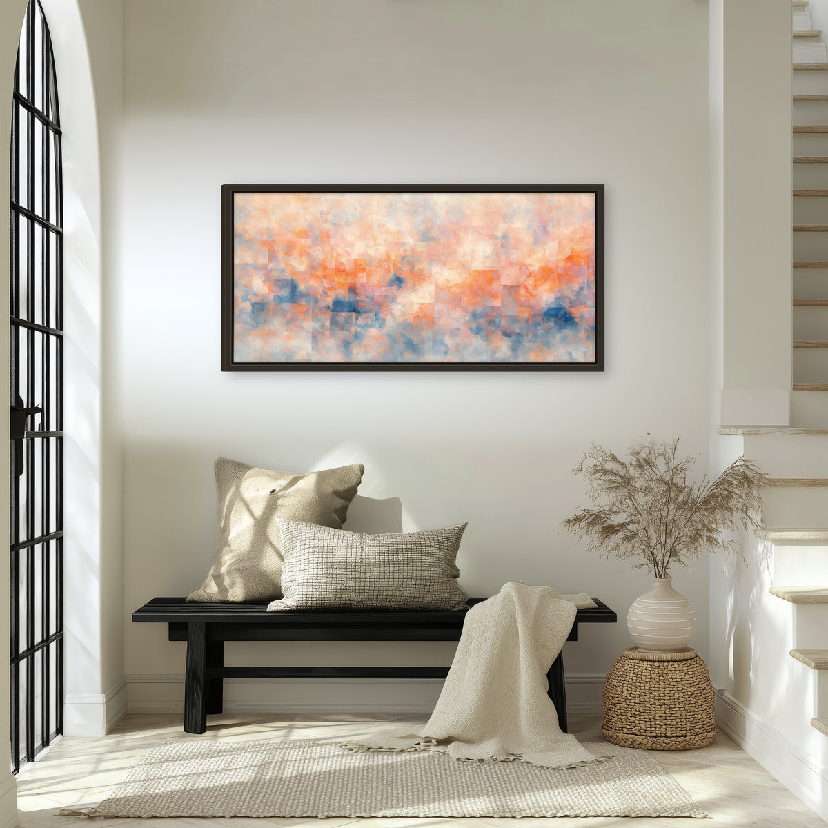 Peach and blue abstract painting framed canvas wall art in an entryway above a bench