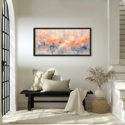 Peach and blue abstract painting framed canvas wall art in an entryway above a bench