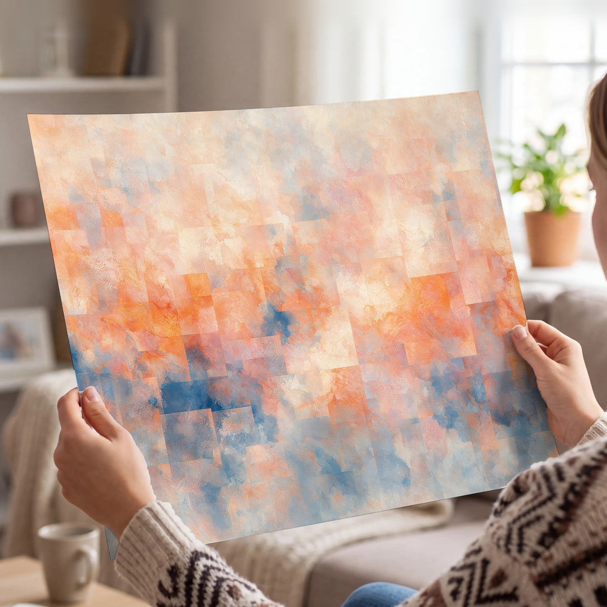 Peach and blue abstract painting poster print held in hands