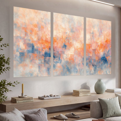 Peach and blue abstract painting set of 3 poster prints in a living room above a console